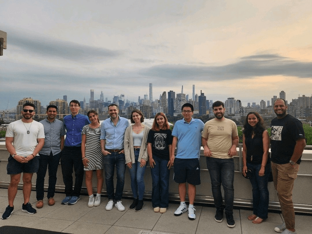 Lab team in 2023, rooftop at dusk with the NYC skyline