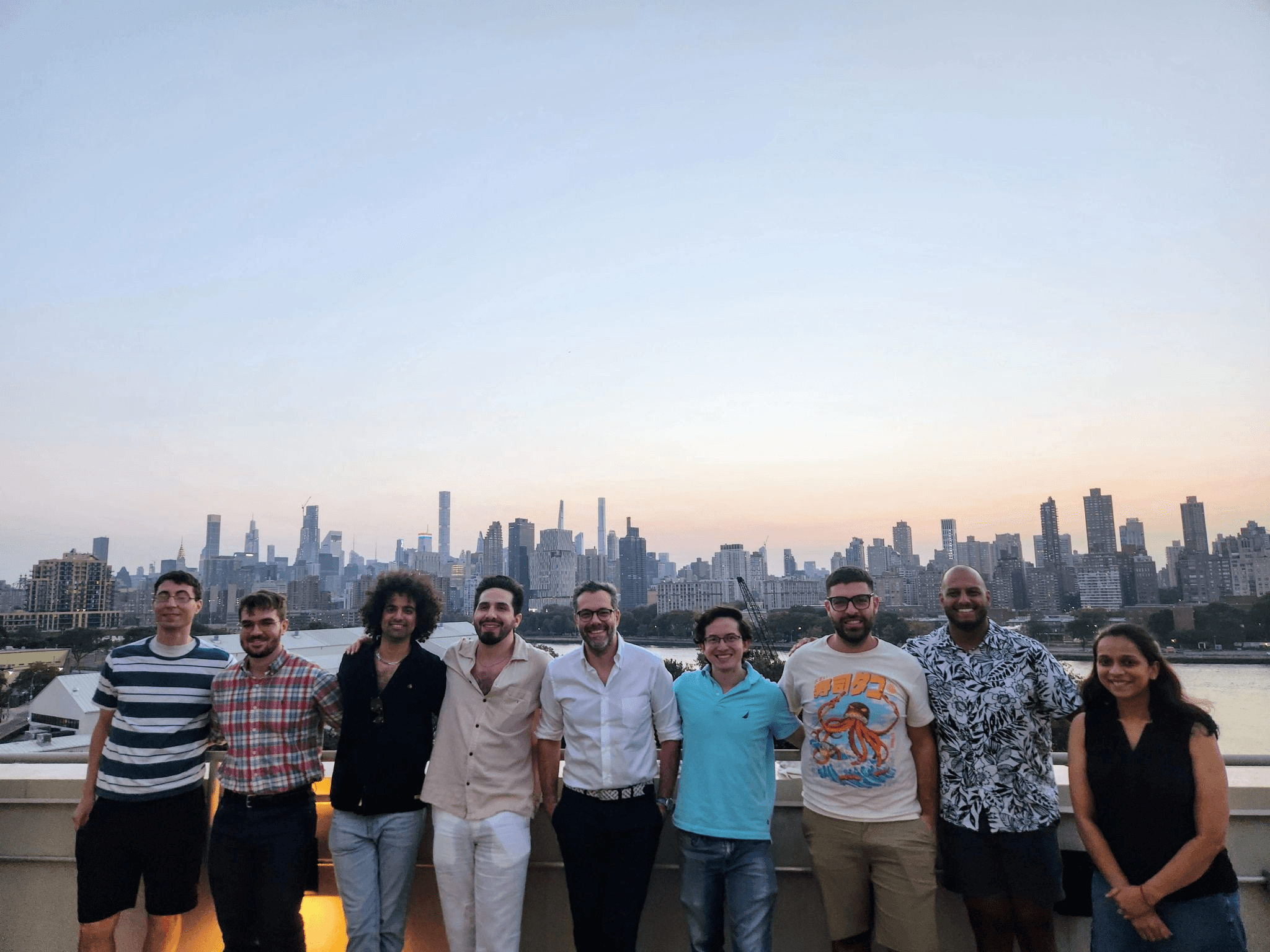 Lab team in 2024, rooftop at sunset with the NYC skyline